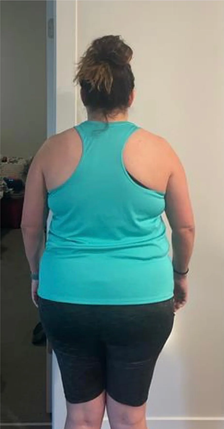 Client photographed from behind before starting coaching with Nathan Brennan