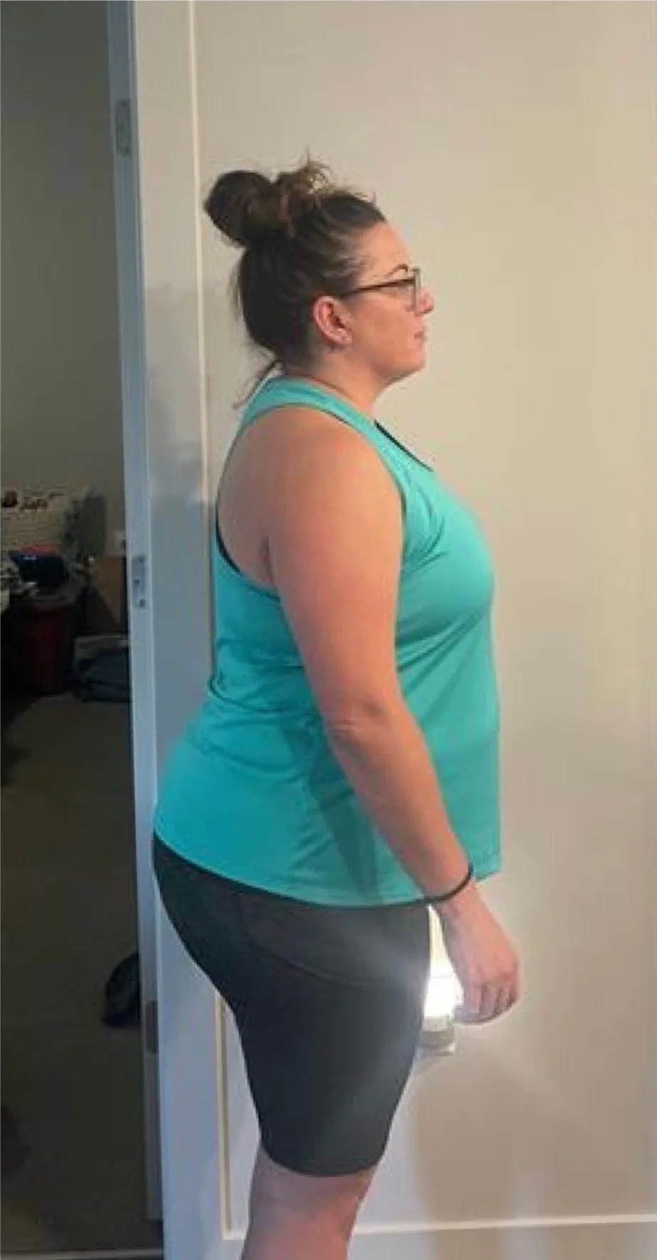 Client photographed from the side before starting coaching with Nathan Brennan
